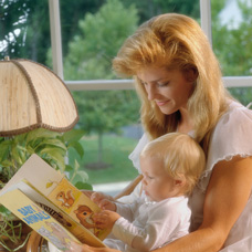 Blond_Mother_Reading_to_Child