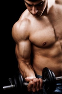 Guy_Building_Muscle_Mass_Dumbbell